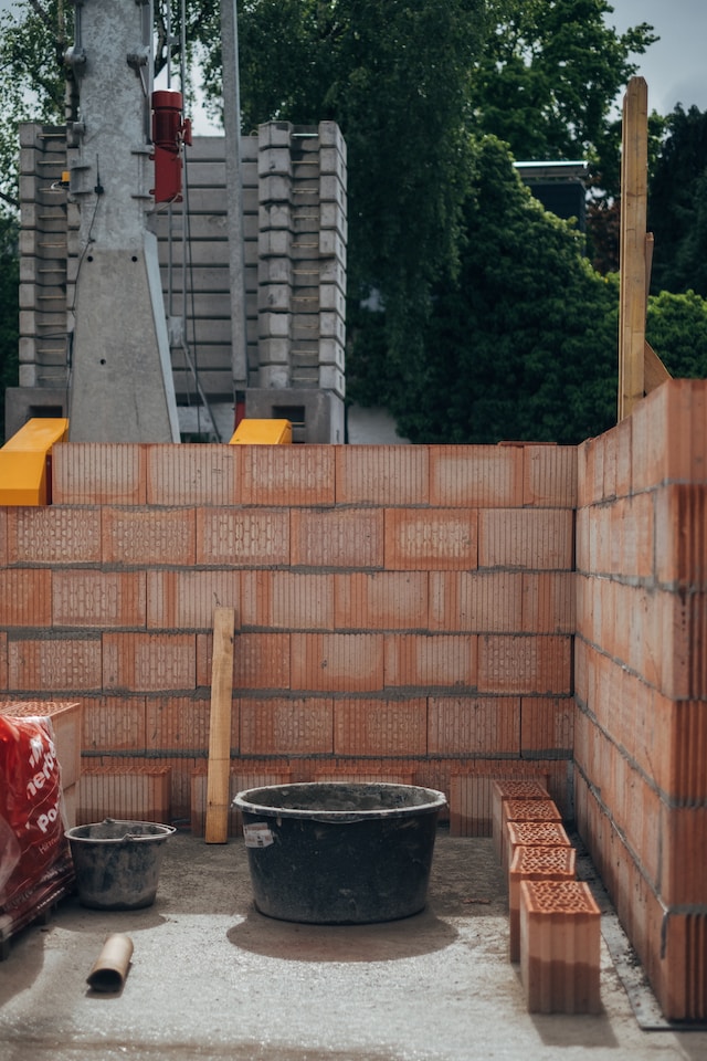 Construction if the foundations of a brick wall.