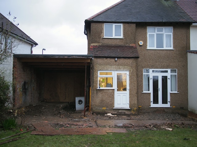 A property with a rundown garden.