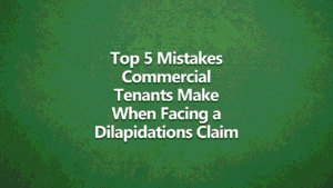 tenant and chartered building surveyor discussing dilapidations claim in office UK